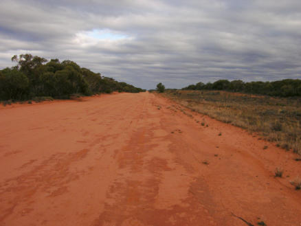 Road to Mungo NP north of Balranald - 100km of red dirt - this will change her mind for sure